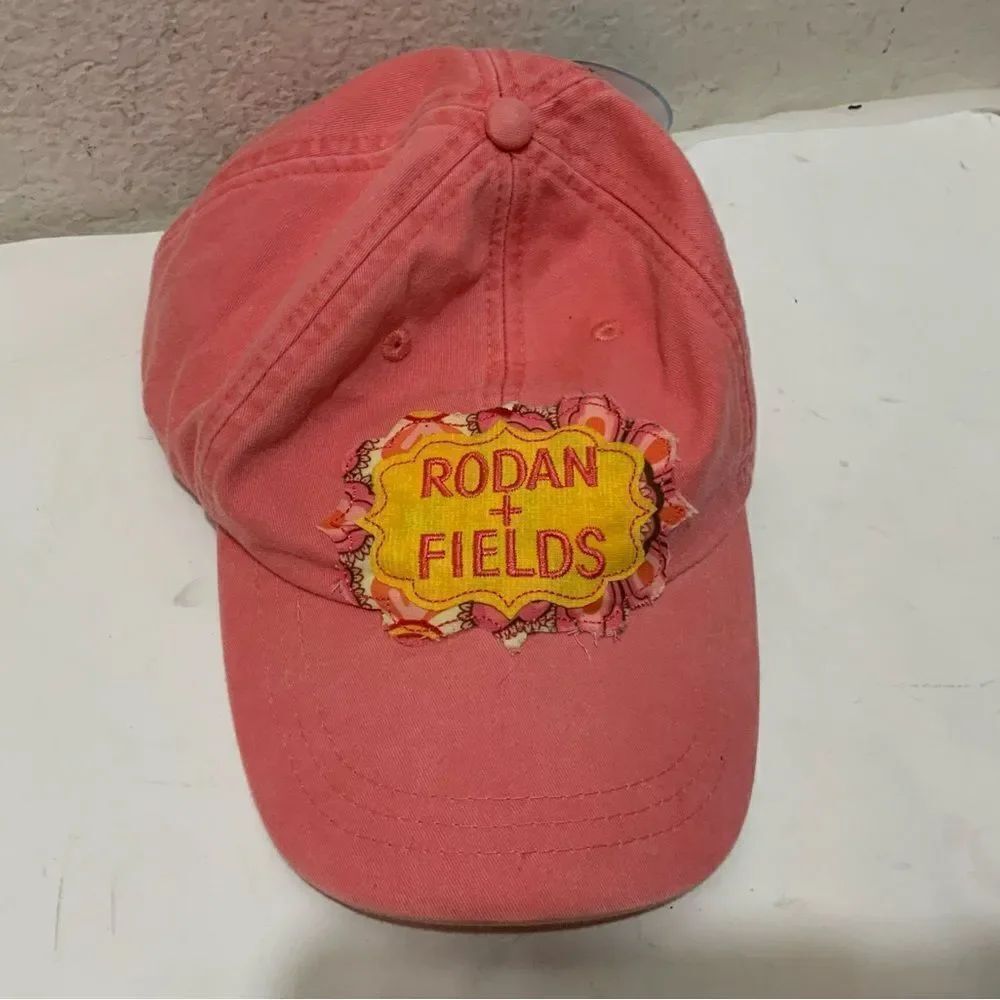Rodan + Fields adjustable distressed baseball hat